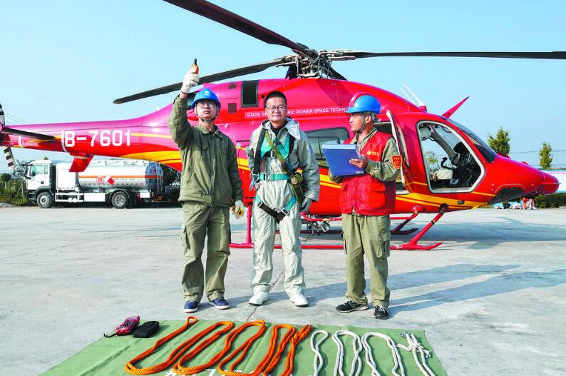 湖北地區(qū)±800千伏特高壓輸電線路規(guī)?；鄙龣C帶電作業(yè)完成